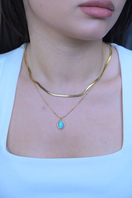 سنسال ذهبي مع حجر ازرق مميز